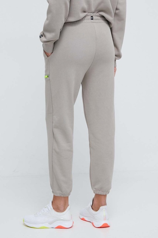 Odzież Under Armour spodnie dresowe Project Rock 1383305 beżowy