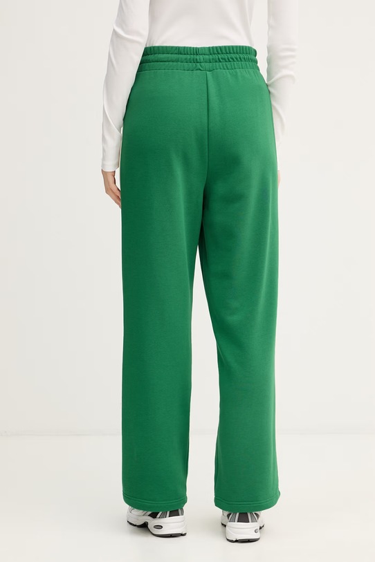 Îmbrăcăminte Puma pantaloni de trening femei ICONIC T7 625411 verde