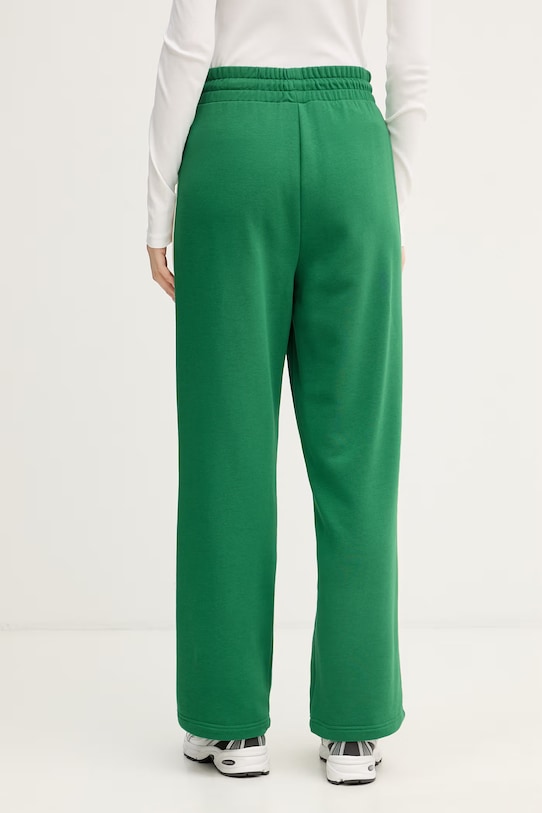 Îmbrăcăminte Puma pantaloni de trening femei ICONIC T7 625411 verde