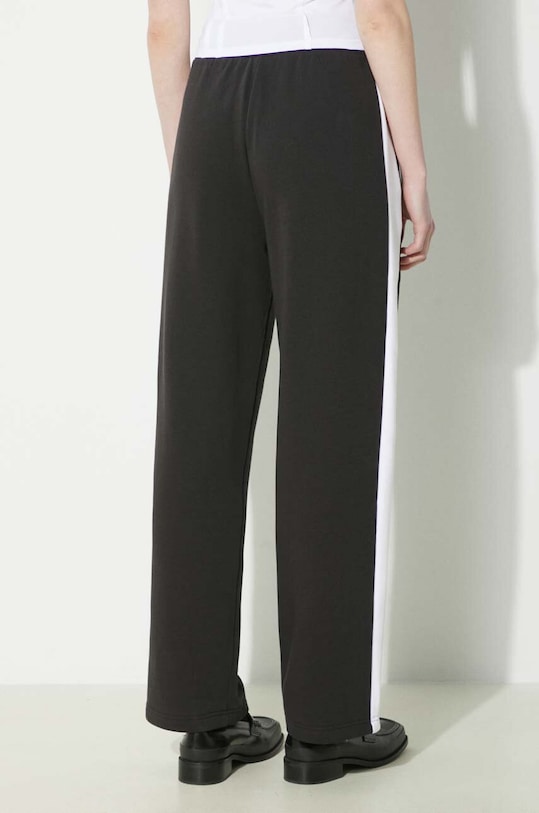 Odzież Puma spodnie dresowe ICONIC T7 625411 czarny