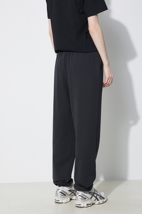 Ρούχα Παντελόνι φόρμας New Balance Sport Essentials WP41500BK μαύρο