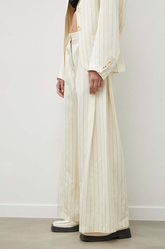 Брюки с примесью льна Remain 501533858 бежевый SS24