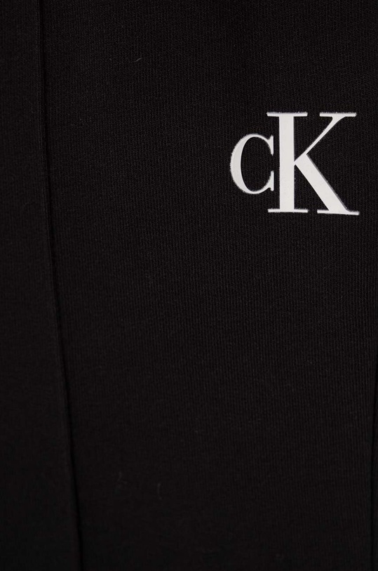 DÍVKA Dětské tepláky Calvin Klein Jeans IG0IG02285.PPYH černá
