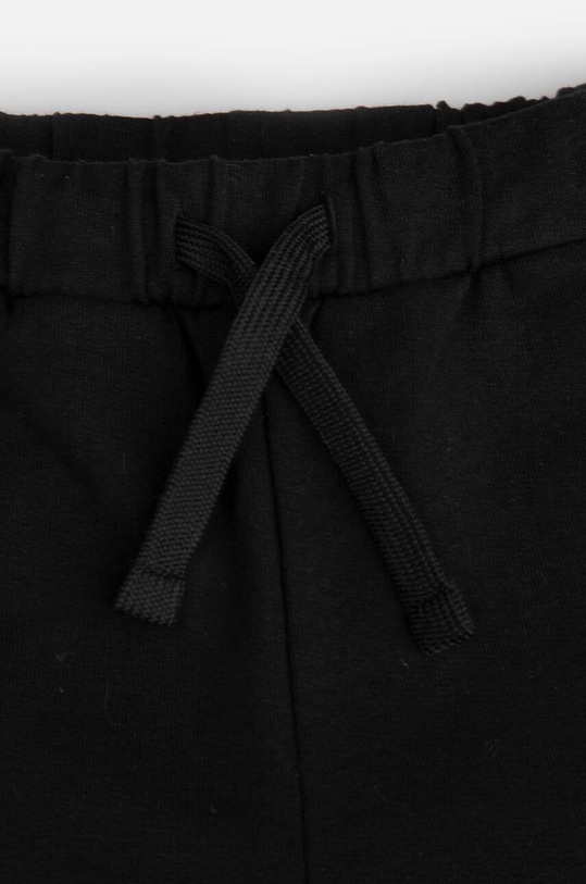 Dziewczynka Coccodrillo spodnie dresowe bawełniane dziecięce WC4120101JPK czarny