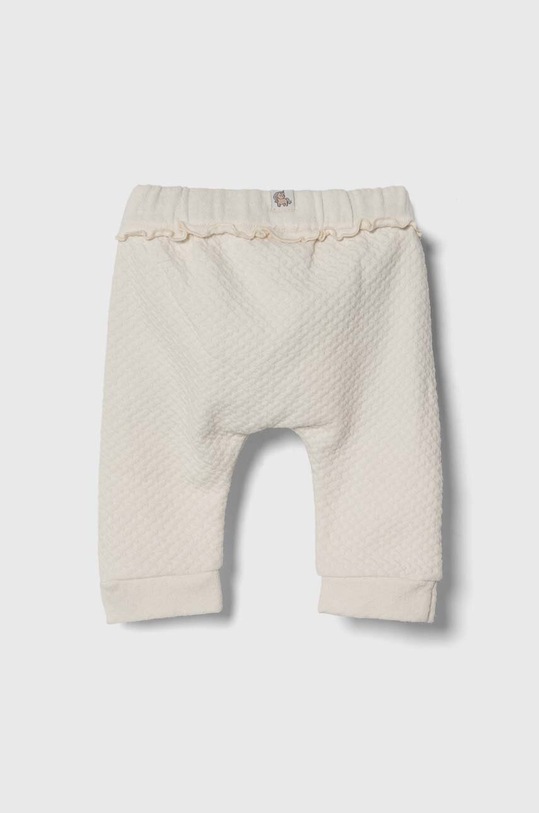 United Colors of Benetton spodnie dresowe niemowlęce 3NDKAF01M.W.Seasonal beżowy SS24