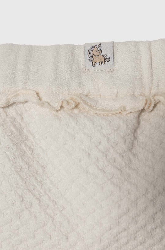 Dziewczynka United Colors of Benetton spodnie dresowe niemowlęce 3NDKAF01M.W.Seasonal beżowy