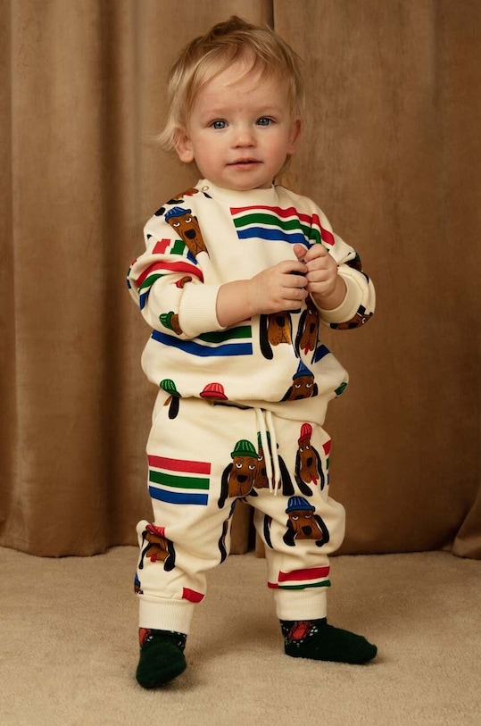 Mini Rodini spodnie dresowe bawełniane dziecięce wzorzyste biały 2413011500