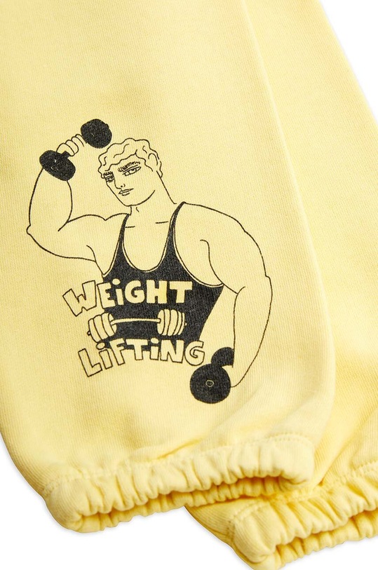 CHLAPEC Dětské bavlněné tepláky Mini Rodini Weight lifting 2423012023 žlutá