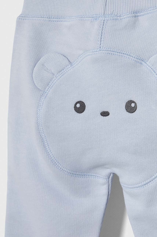 Chłopiec United Colors of Benetton spodnie dresowe bawełniane niemowlęce 3J70AF01L.W.Seasonal niebieski