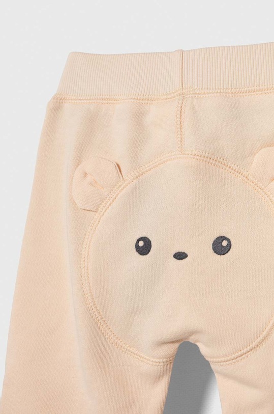 Chłopiec United Colors of Benetton spodnie dresowe bawełniane niemowlęce 3J70AF01L.W.Seasonal pomarańczowy