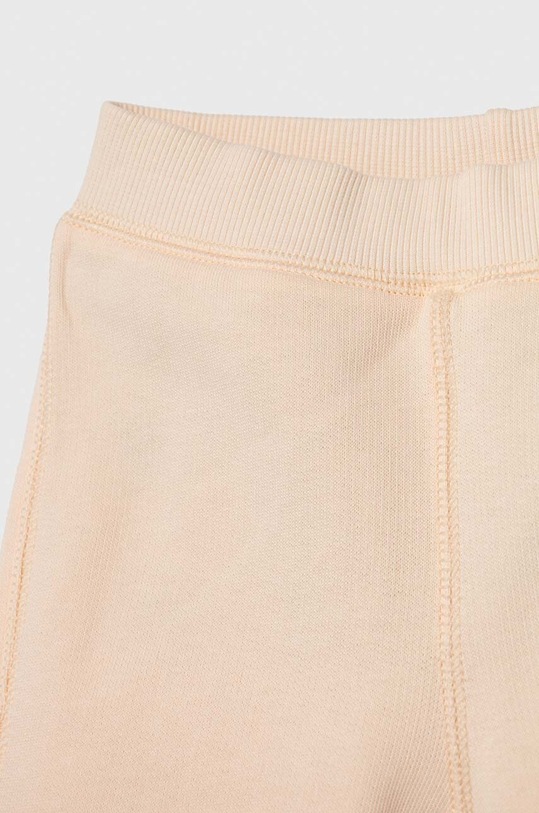 United Colors of Benetton spodnie dresowe bawełniane niemowlęce pomarańczowy 3J70AF01L.W.Seasonal