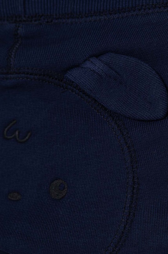 Chłopiec United Colors of Benetton spodnie dresowe bawełniane niemowlęce 3J70AF01L.W.Seasonal granatowy