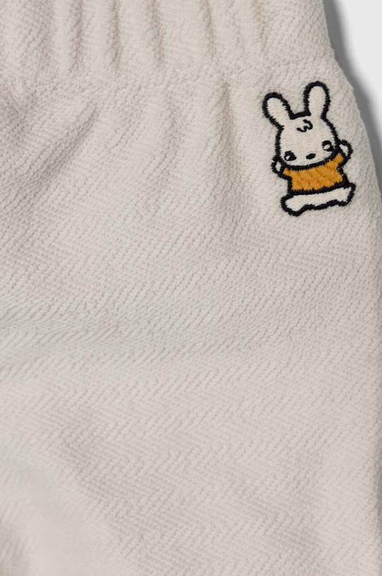 Chłopiec United Colors of Benetton spodnie dresowe bawełniane niemowlęce 39T2AF01N.W.Seasonal beżowy