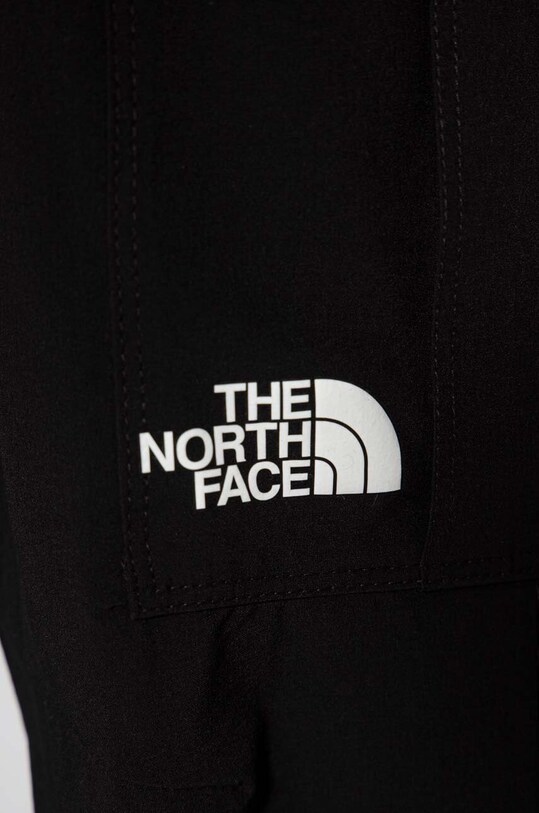 Băieți The North Face pantaloni de trening pentru copii WOVEN CARGO PANT NF0A877T negru