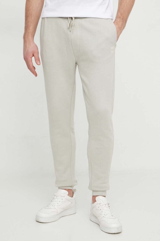 BOSS Orange pantaloni de trening din bumbac uni bej 50509303