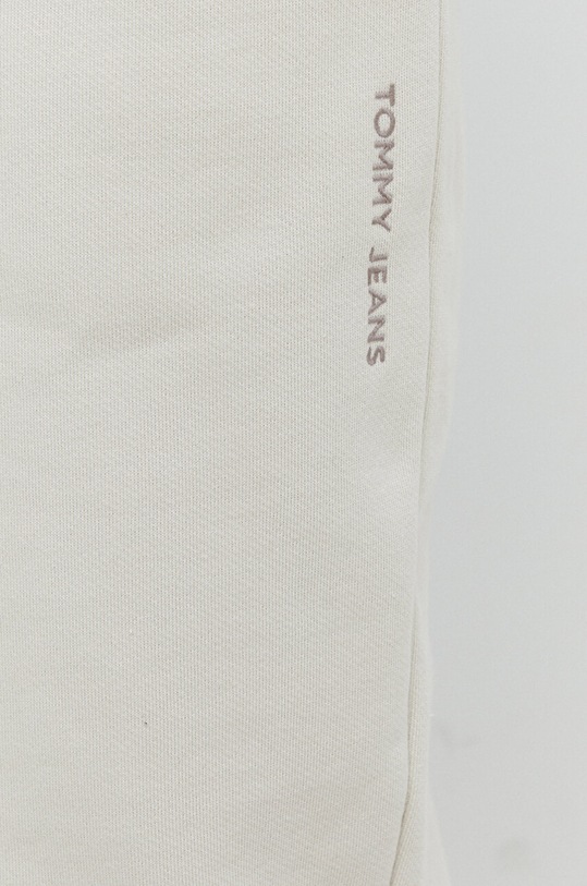 Tommy Jeans spodnie dresowe bawełniane beżowy DM0DM18378