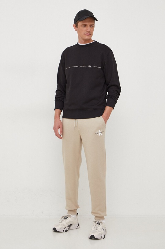 Calvin Klein Jeans spodnie dresowe J30J324685 beżowy SS24