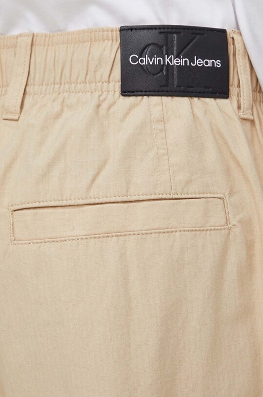 Бавовняні штани Calvin Klein Jeans бежевий J30J324692