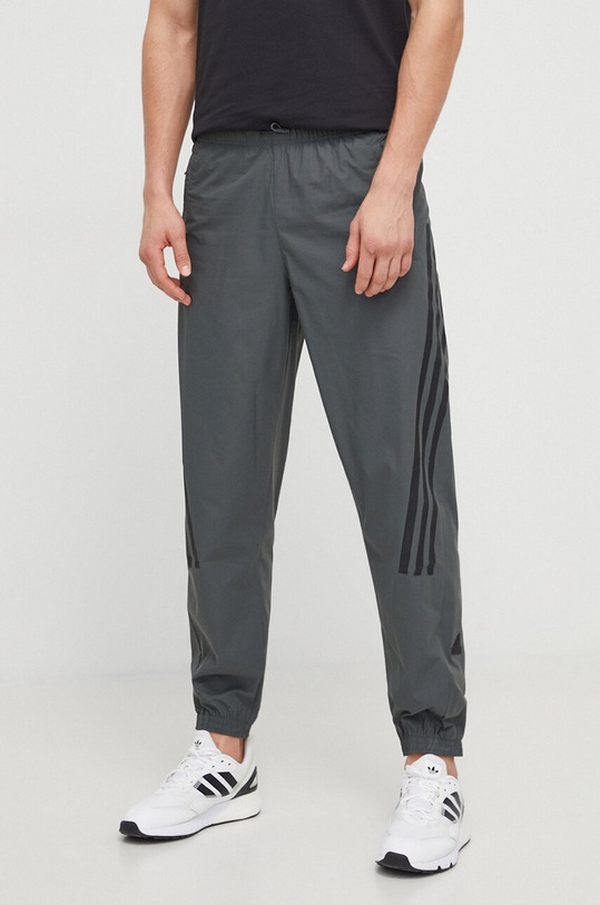 Tepláky adidas látka zelená IR9238