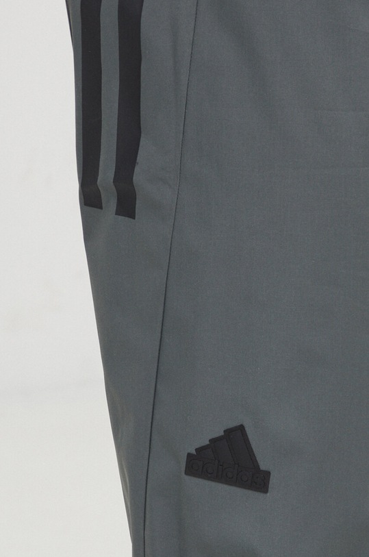 Tepláky adidas zelená IR9238