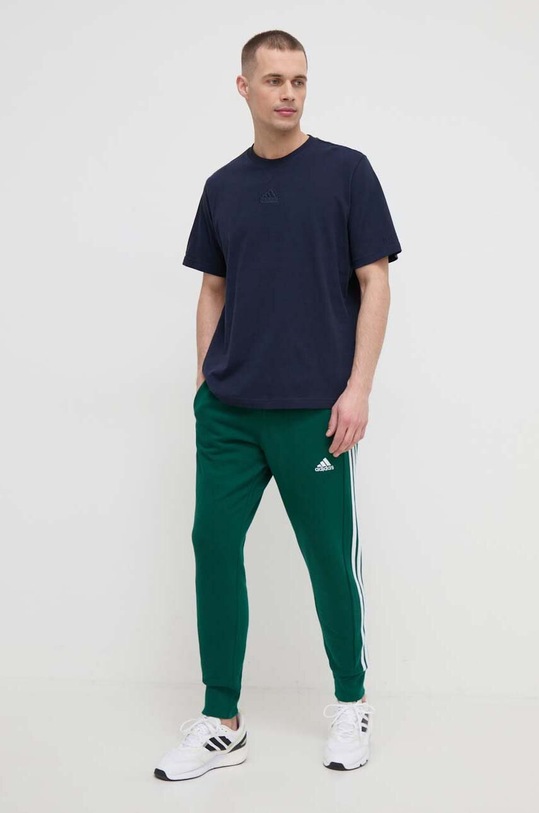 Bavlnené tepláky adidas IS1392 zelená SS24