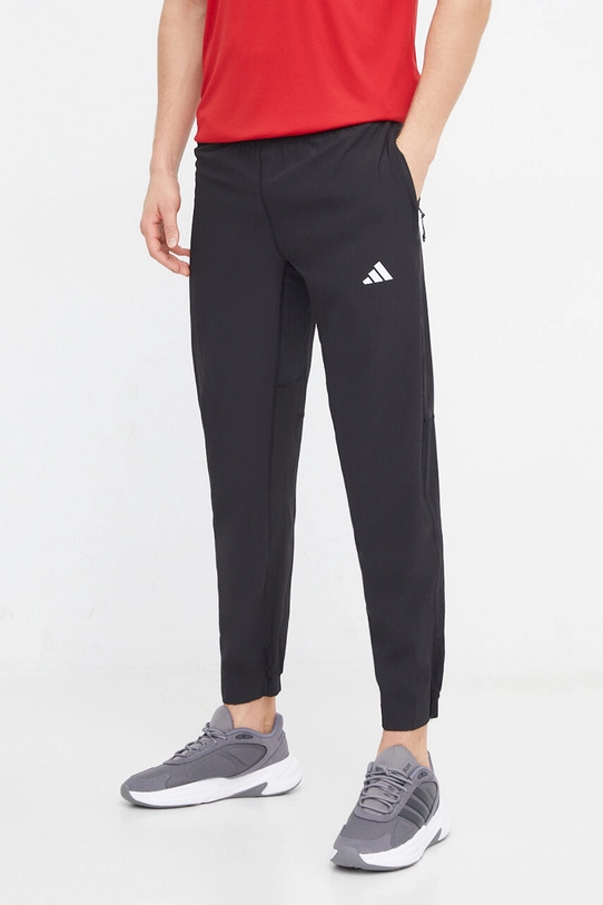 Hlače za trening adidas Performance TR-ES bez uzorka crna IT5457