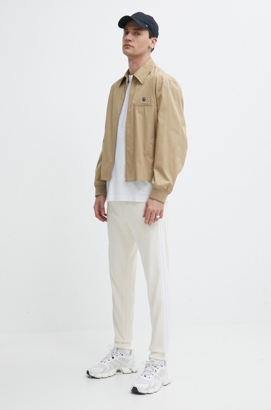 adidas Originals spodnie dresowe Adicolor Classics SST IR9878 beżowy SS24