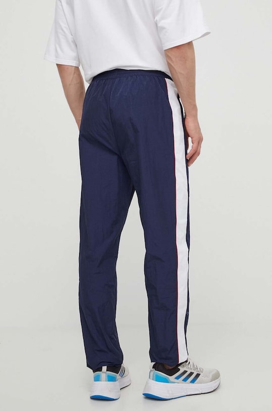 Odzież Fila spodnie dresowe Luoyang FAM0659 granatowy