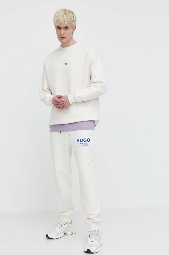 Bavlněné tepláky Hugo Blue 50510734 béžová AW25