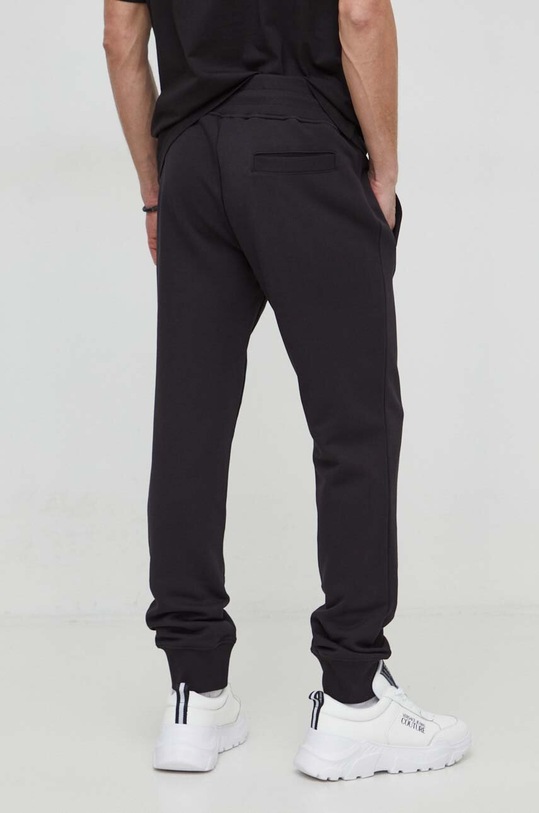 Odzież Versace Jeans Couture spodnie dresowe bawełniane 76GAAT02.CF01T czarny