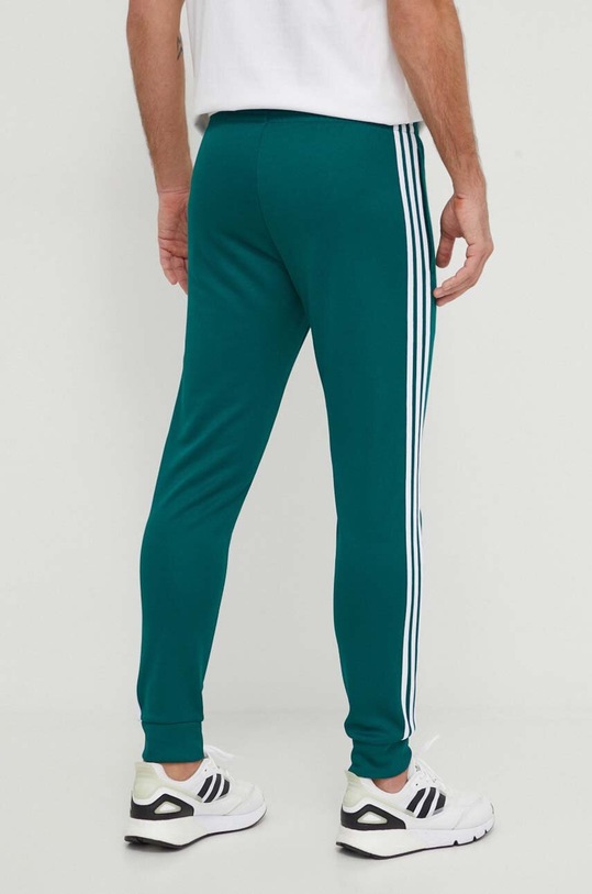 Donji dio trenirke adidas Originals Adicolor Classics SST Track Pants IR9886 zelena SS24