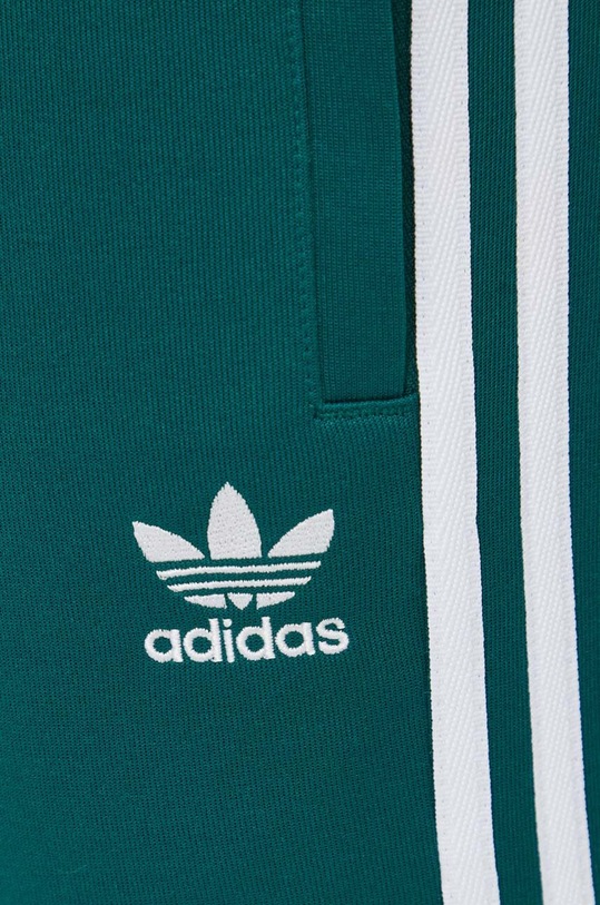 Odjeća Donji dio trenirke adidas Originals Adicolor Classics SST Track Pants IR9886 zelena
