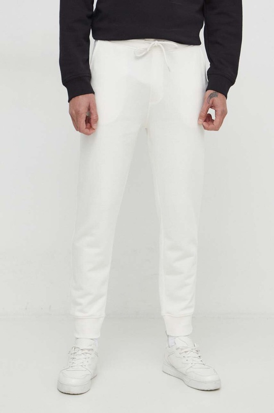 United Colors of Benetton spodnie dresowe bawełniane bawełna beżowy 3J68UF00K