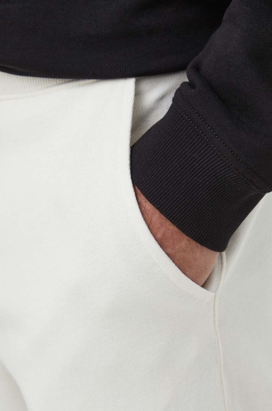 United Colors of Benetton spodnie dresowe bawełniane beżowy 3J68UF00K