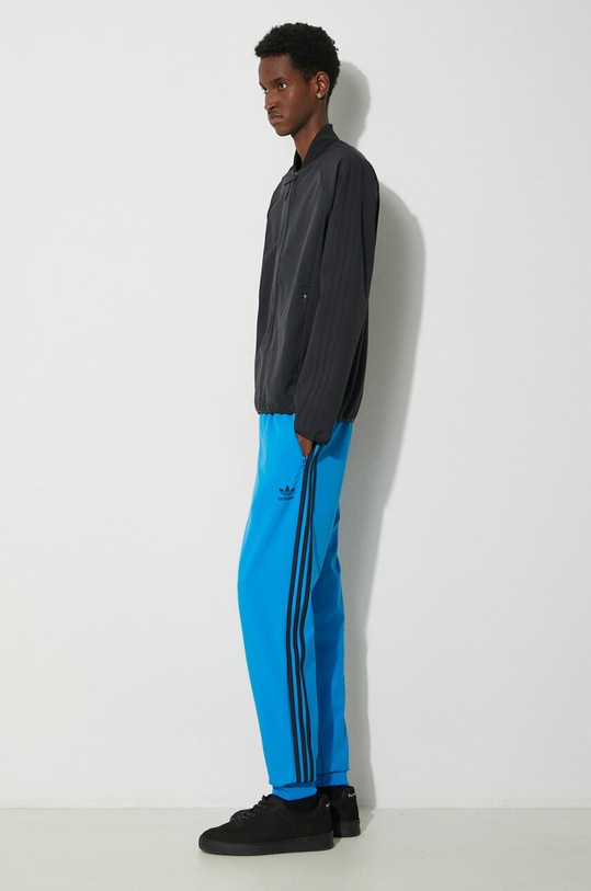 Donji dio trenirke adidas Originals SST Bonded IM9881 plava SS24