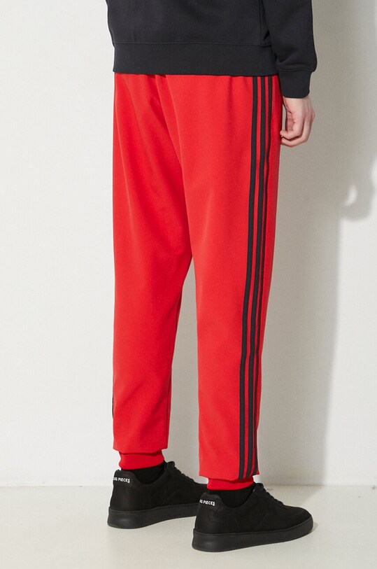 Одежда Спортивные штаны adidas Originals IS2808 красный