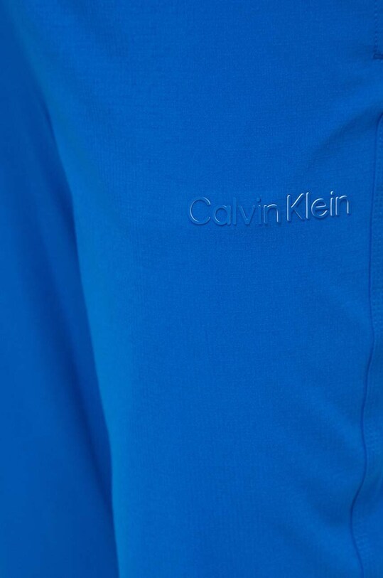Tepláky Calvin Klein Performance modrá 00GMS4P633