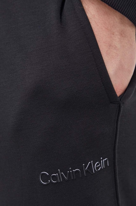 Tréninkové kalhoty Calvin Klein Performance černá 00GMS4P634