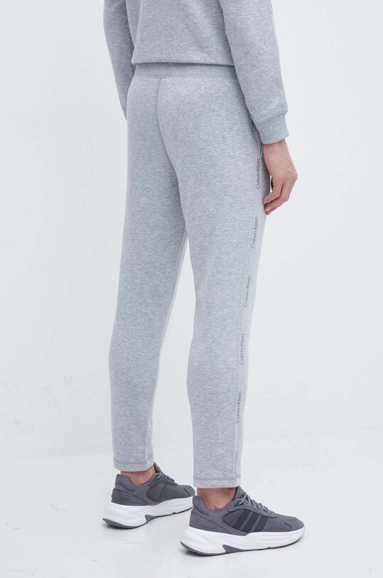 Одежда Тренировочные брюки Calvin Klein Performance 00GMS4P641 серый