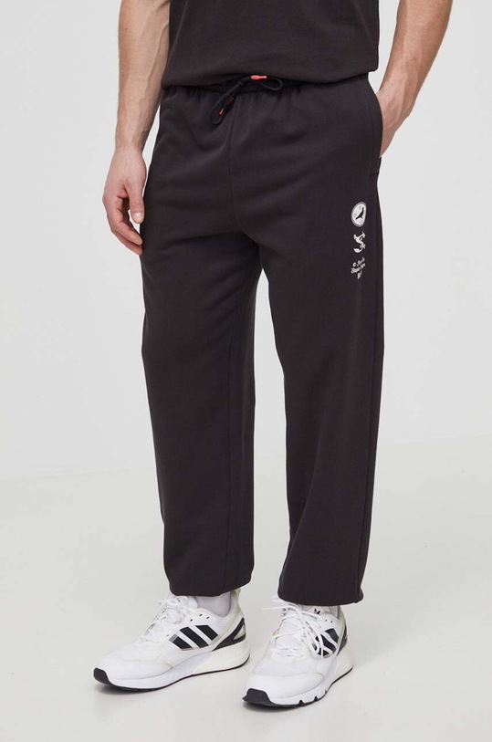 Bavlněné tepláky Puma X STAPLE pletenina černá 625885