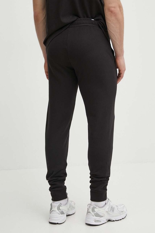 Oblečení Bavlněné tepláky Puma BETTER ESSENTIALS 675980 černá