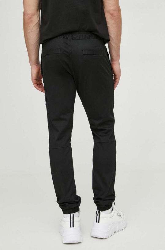 Odzież Calvin Klein Jeans spodnie J30J325114 czarny