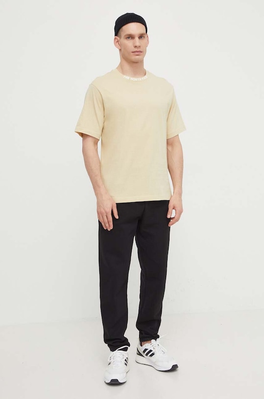 Bavlnené tepláky The North Face NF0A87DEJK31 čierna SS24