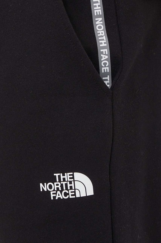 Bavlnené tepláky The North Face čierna NF0A87DEJK31