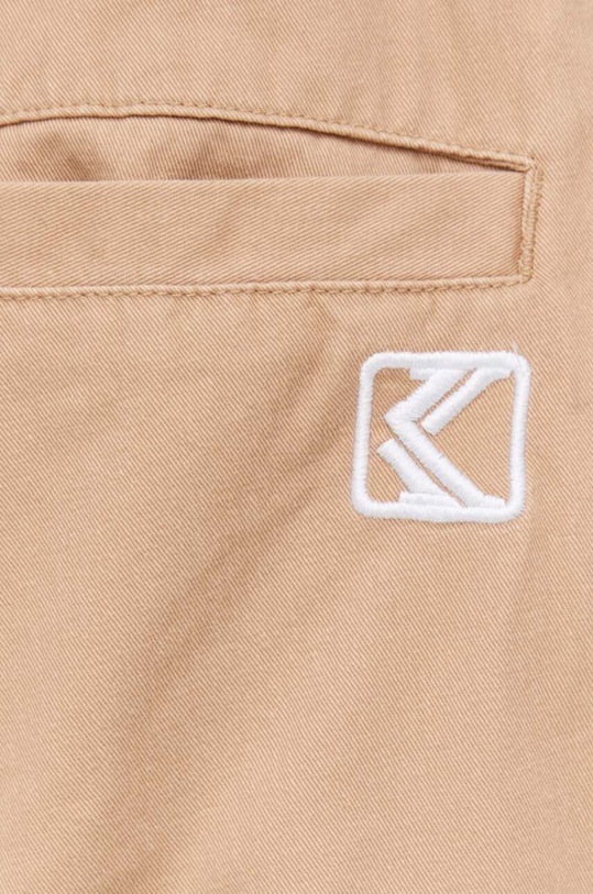 Karl Kani pantaloni de bumbac bej 6003568