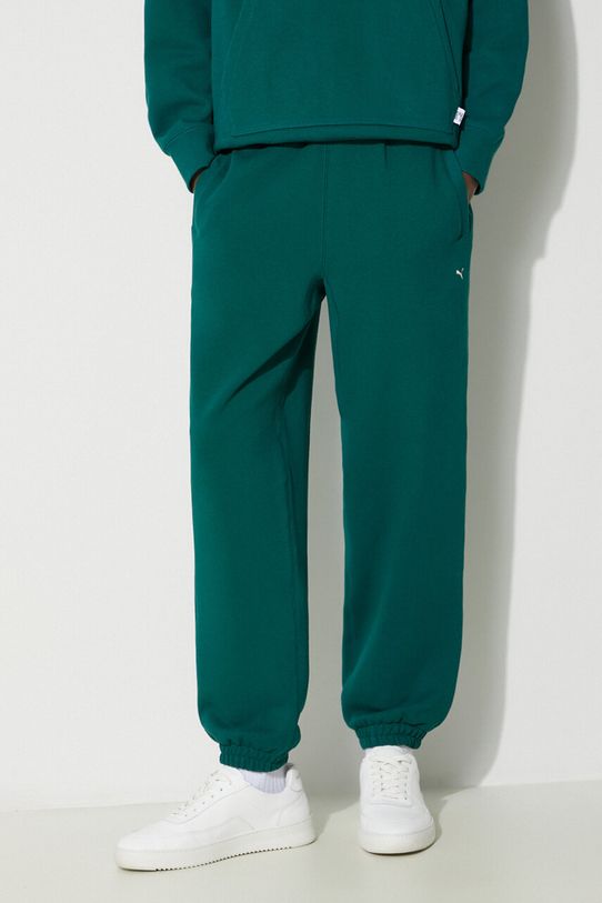 Pamučni donji dio trenirke Puma MMQ Sweatpants pamuk tirkizna 624007