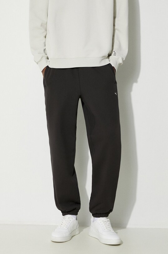 Odjeća Pamučni donji dio trenirke Puma MMQ Sweatpants 624007 crna