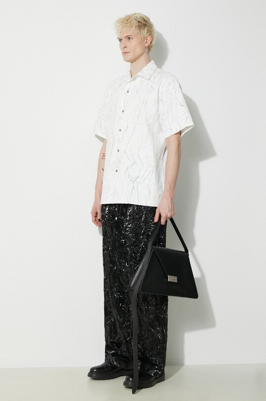 Kalhoty Han Kjøbenhavn Elasticated Track Pants M.133836 černá SS24