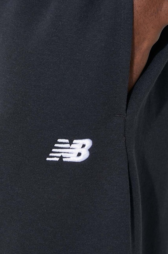 New Balance spodnie dresowe Essentials French Terry Jogger MP41519BK czarny