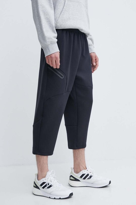Under Armour spodnie dresowe z elastanem czarny 1384010